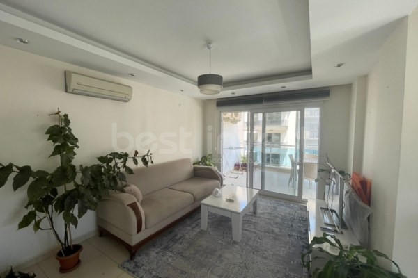 Furnished 1+1 Apartment for Sale in Cikcilli Neighborhood: Comfortable Living Close to the Sea