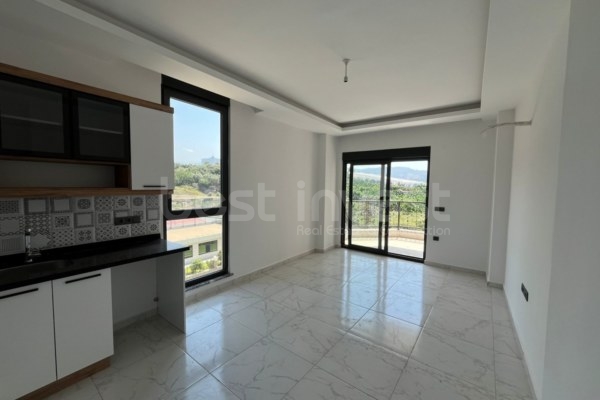 Comfortable Living in Alanya Mahmutlar: 1+1 Apartment for Sale