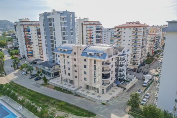 Fully Equipped 1+1 Living and Investment Opportunity in Mahmutlar Center, Novita 11